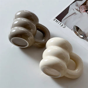 Keramiktasse mit Donut-Prägung