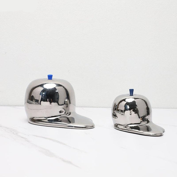 Escultura de manzana de cromo derretido