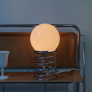 Lampe de table en verre avec base à ressort