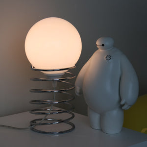 Lampe de table en verre avec base à ressort