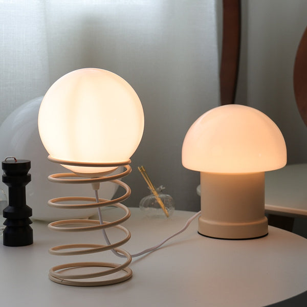 Lampe de table en verre avec base à ressort