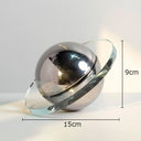 Escultura geométrica del planeta Saturno hecha a mano en cristal macizo