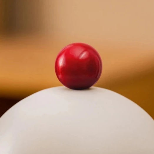 Chauffe-bougie moderne avec boule rouge