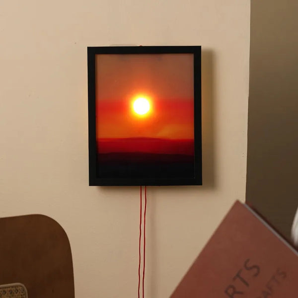 Rising and Falling Sun Wall Lamp