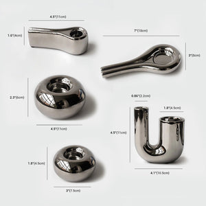 Versilberter geometrischer Kerzenhalter aus Keramik