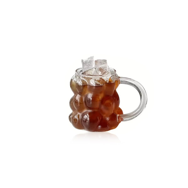 Transparente Tasse mit Traubenmotiv