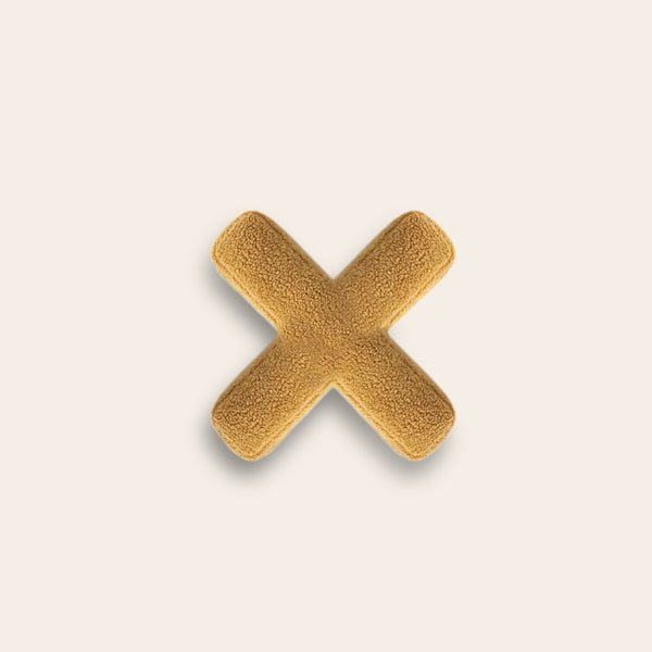 Sofakissen mit Alphabet-Motiv