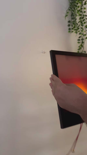 Rising and Falling Sun Wall Lamp