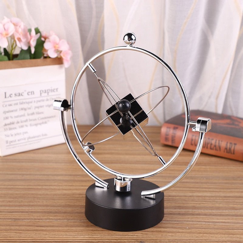 Ball Rotating Perpetual Motion Pendulum Interactive Ornament - OnShelf