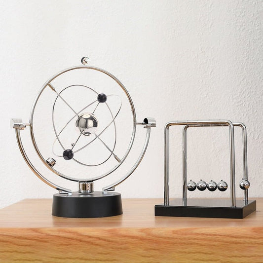Ball Rotating Perpetual Motion Pendulum Interactive Ornament - OnShelf