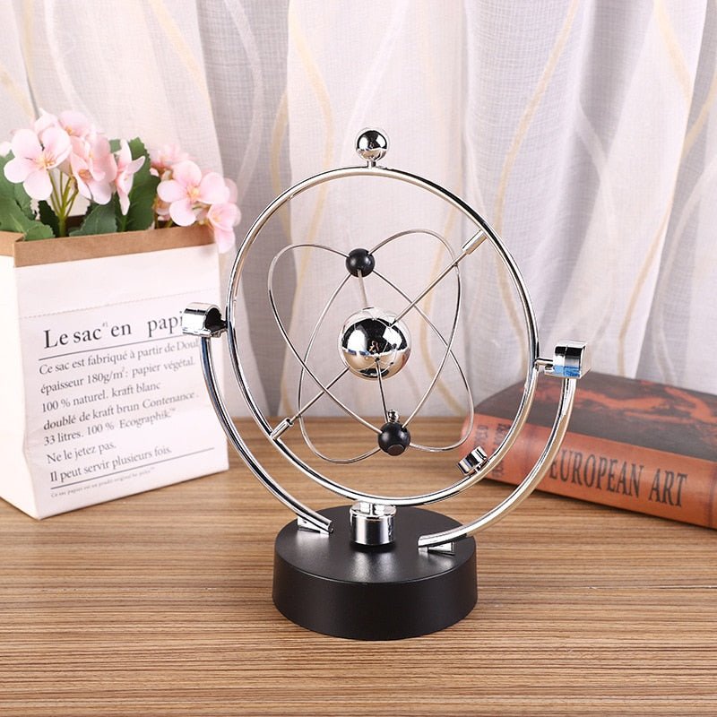 Ball Rotating Perpetual Motion Pendulum Interactive Ornament - OnShelf