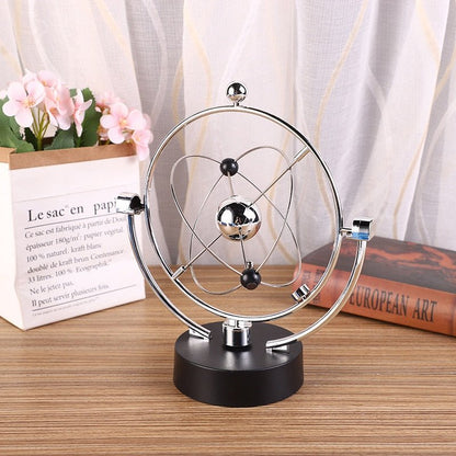 Ball Rotating Perpetual Motion Pendulum Interactive Ornament - OnShelf